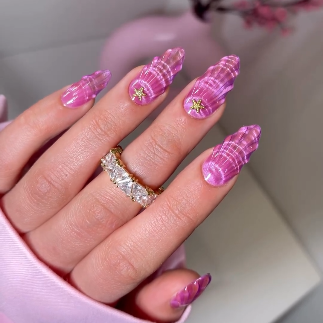 Seashell Blossom press-on nails on hand - lifestyle photo, cat-eye velvet finish