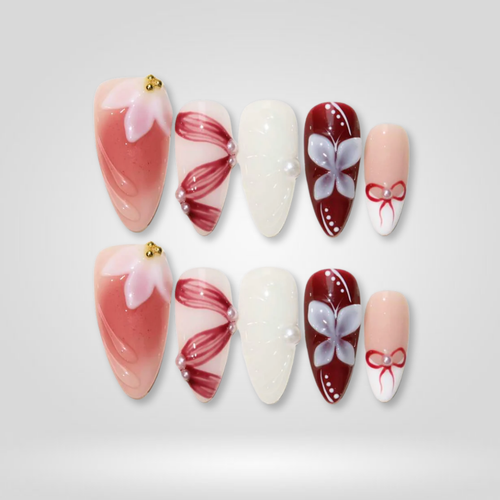 Blush Ribbon seasonal press-on nails - almond shape, front view