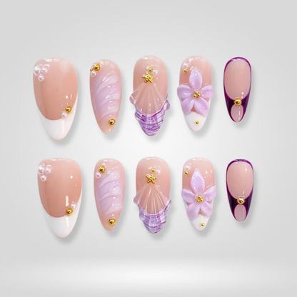 Golden Lily floral press-on nails - almond shape, front view