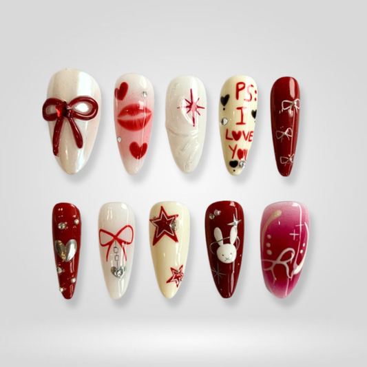 Ruby Bow berry press-on nails - almond shape, front view