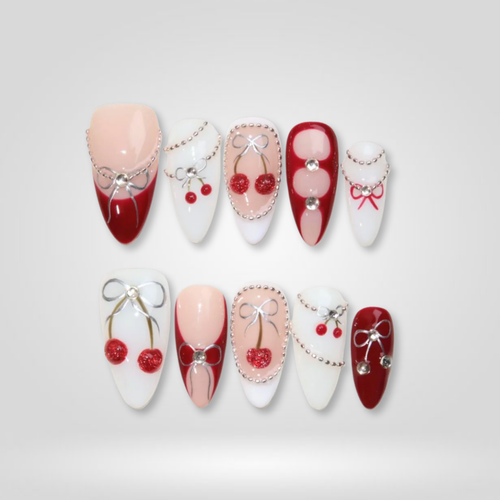 Silver Cherry pearl-shift press-on nails - almond shape, front view