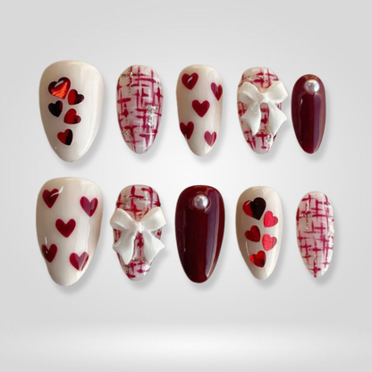 Bow Charm seasonal press-on nails - almond shape, front view