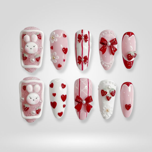 Cherry Charm berry press-on nails - almond shape, front view