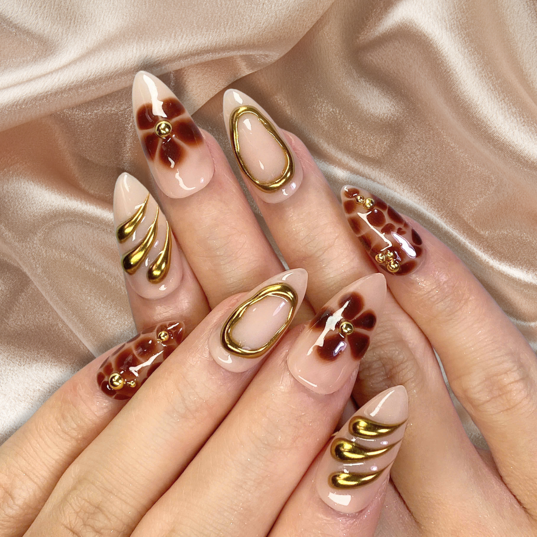Luxe Essence press-on nails on hand - lifestyle photo, pearl-shift finish