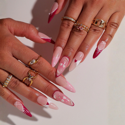 Valentine Romance press-on nails on hand - lifestyle photo, cat-eye velvet finish