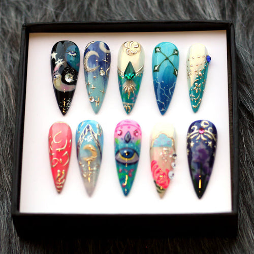 Moon & Star sparkle press-on nails - stiletto shape, front view