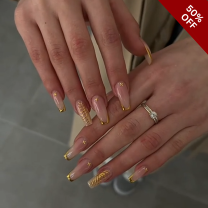 Golden Whisper press-on nails on hand - lifestyle photo, cat-eye velvet finish