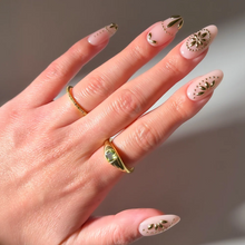 Athenian Gold 3d sculptural press-on nails - oval shape, front view