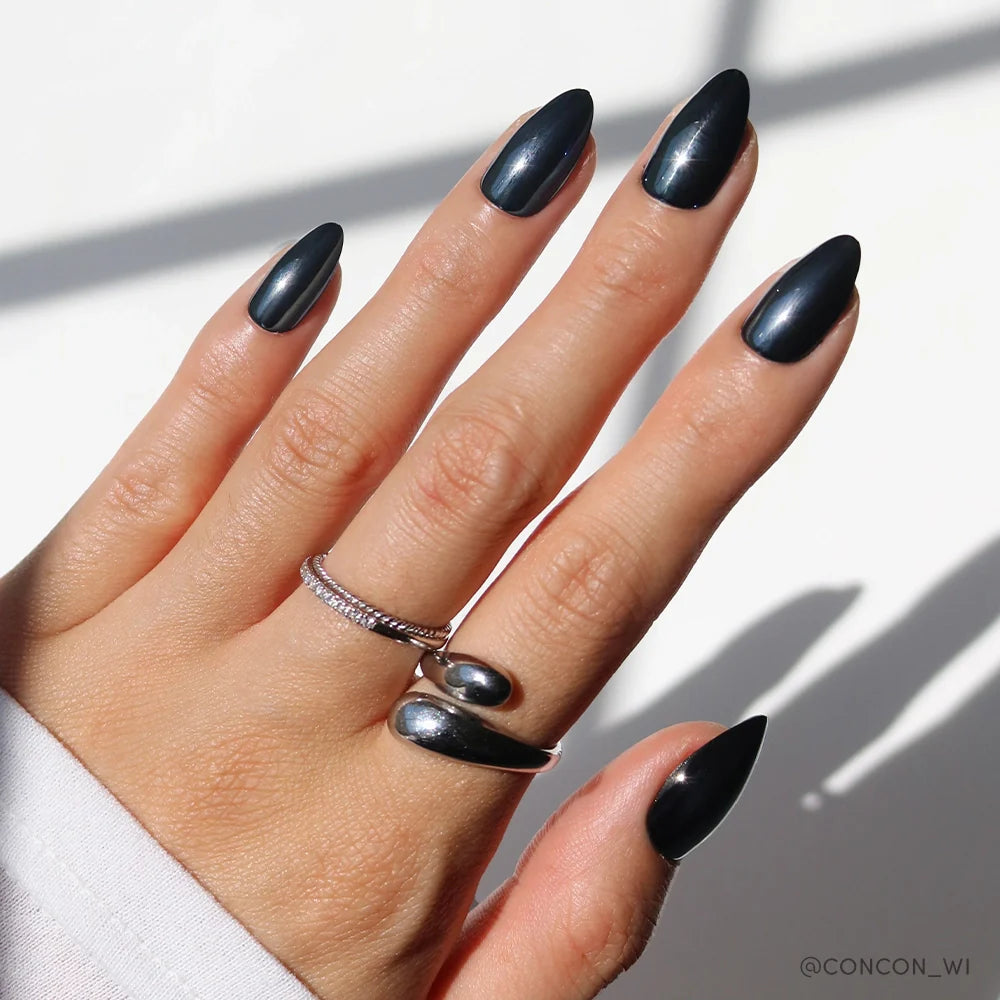Black Metal pearl-shift press-on nails - almond shape, front view