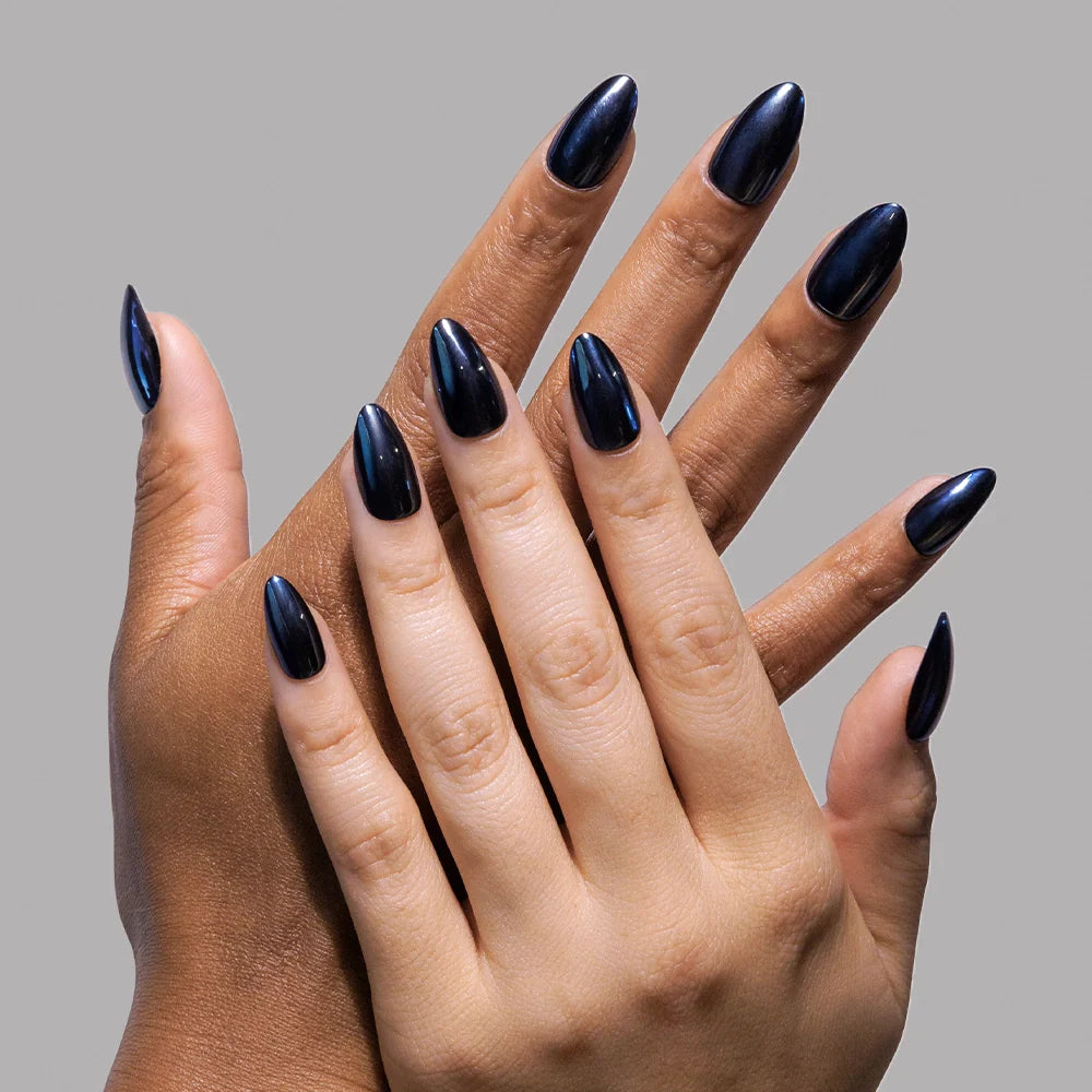 Black Metal press-on nails on hand - lifestyle photo, pearl-shift finish