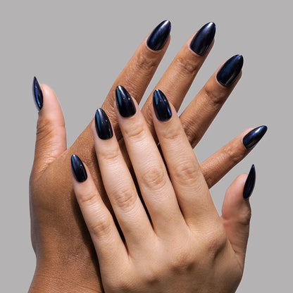 Black Metal press-on nails on hand - lifestyle photo, pearl-shift finish