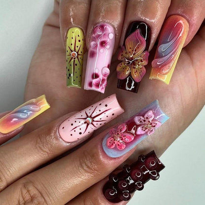 Neon Bloom press-on nails on hand - lifestyle photo, floral finish