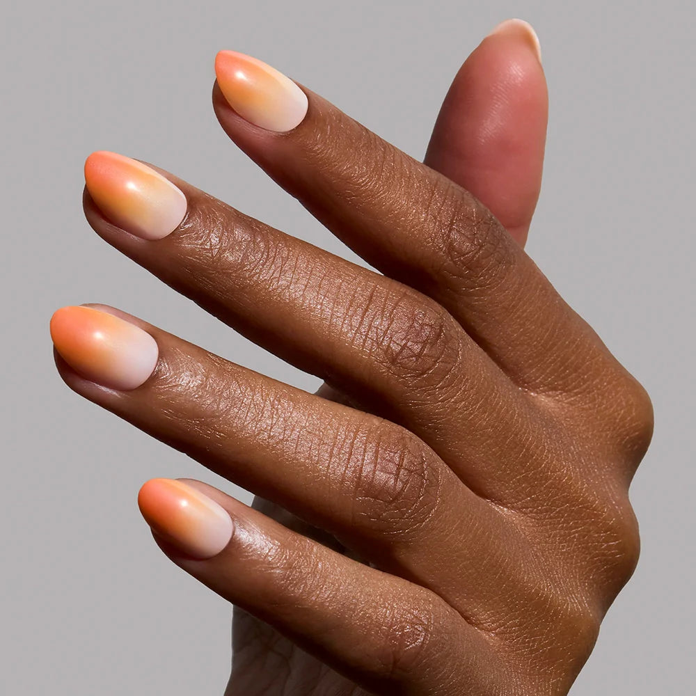 Candy Corn press-on nails on hand - lifestyle photo, jelly glaze finish