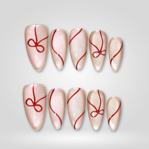 Ruby Swirl berry press-on nails - almond shape, front view