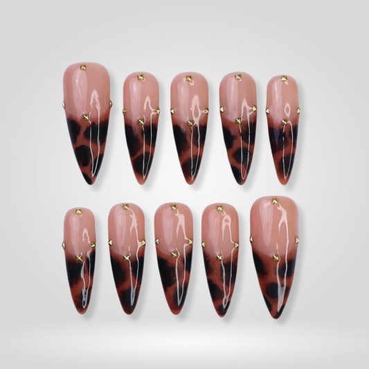 Tortoise Chics soft neutral press-on nails - almond shape, front view