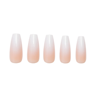 Creme de Nude press-on nails on hand - lifestyle photo, french tip finish