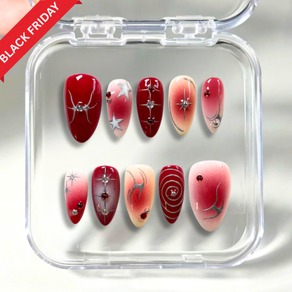 Crimson Orbit press-on nails on hand - lifestyle photo, 3d sculptural finish