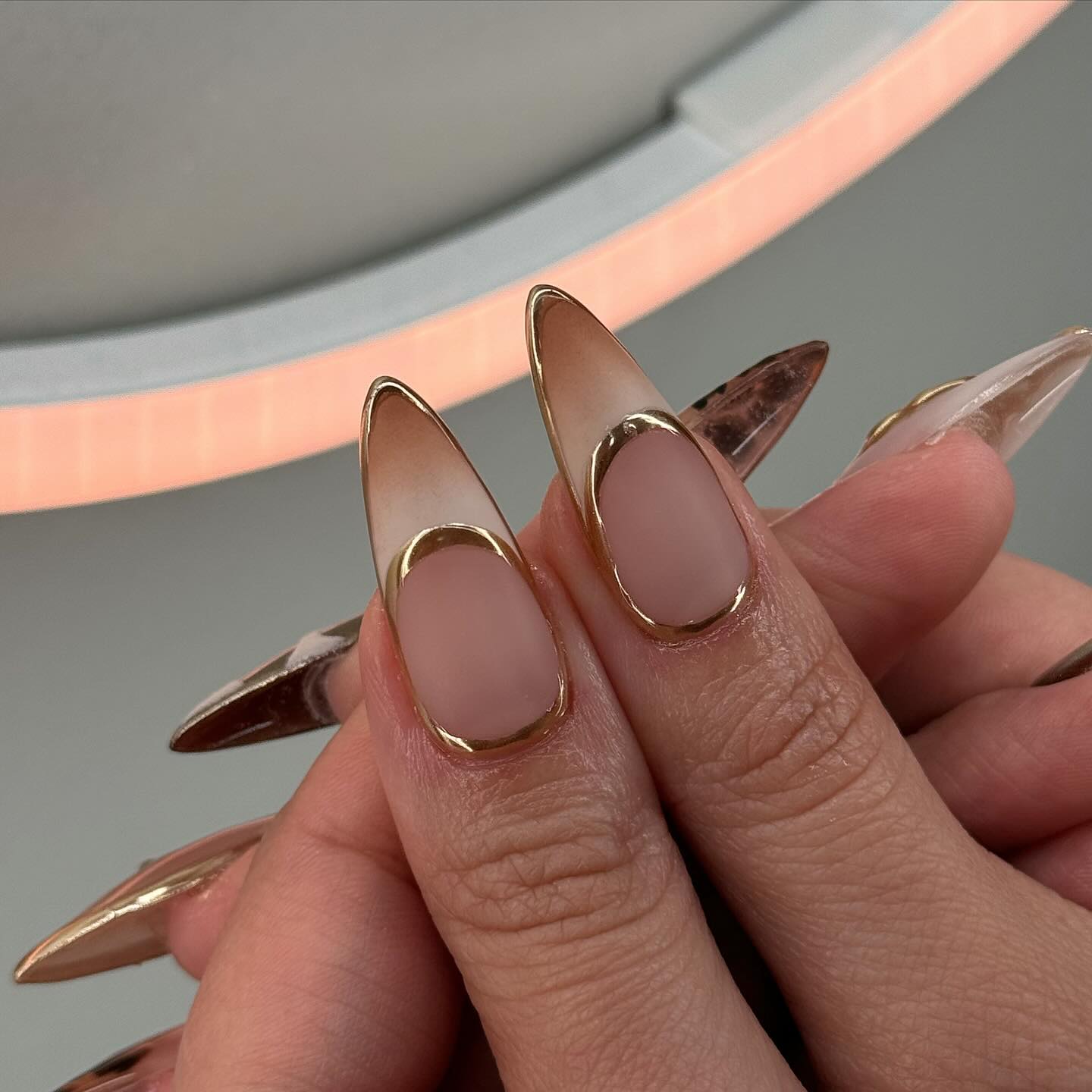 Gilded Safari press-on nails on hand - lifestyle photo, milky cloud dancer finish