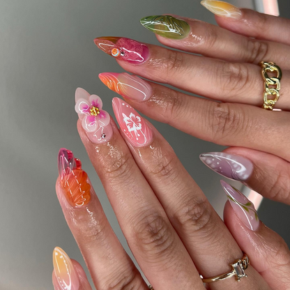 Summer Bloom press-on nails on hand - lifestyle photo, cat-eye velvet finish