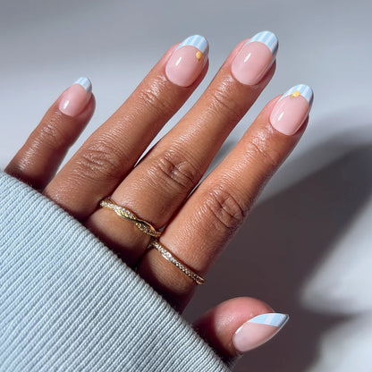Summer Fresco butter yellow press-on nails - oval shape, front view