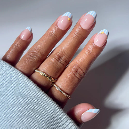 Summer Fresco butter yellow press-on nails - oval shape, front view