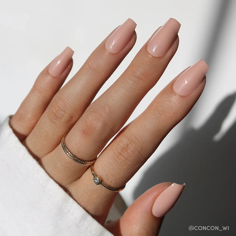 Exposed soft neutral press-on nails - coffin/ballerina shape, front view