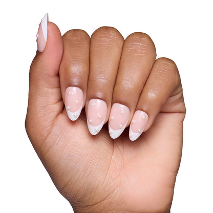 French Pearl press-on nails on hand - lifestyle photo, milky cloud dancer finish