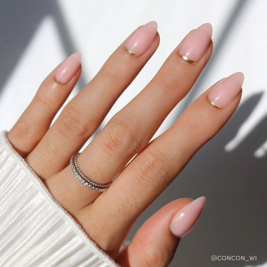 Goal Chaser french tip press-on nails - almond shape, front view
