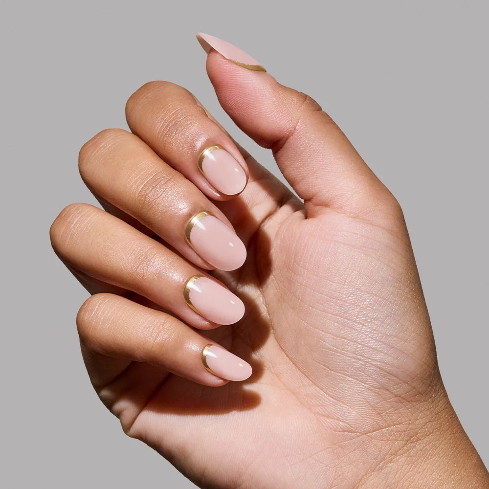 Goal Digger press-on nails on hand - lifestyle photo, french tip finish