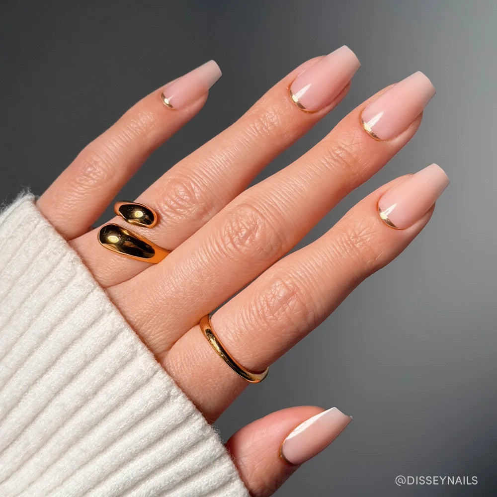 Gold Goals french tip press-on nails - coffin/ballerina shape, front view