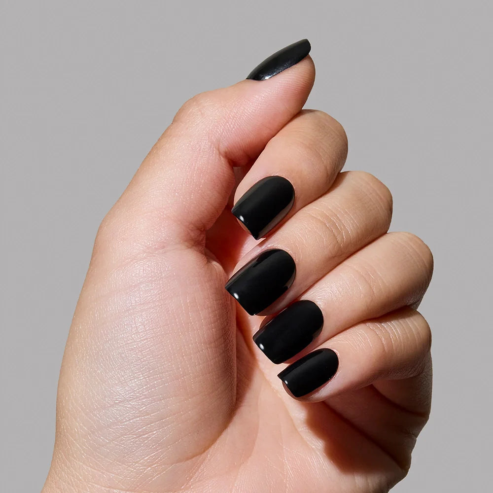 Jet Black press-on nails on hand - lifestyle photo, seasonal finish