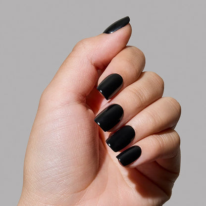 Jet Black press-on nails on hand - lifestyle photo, seasonal finish