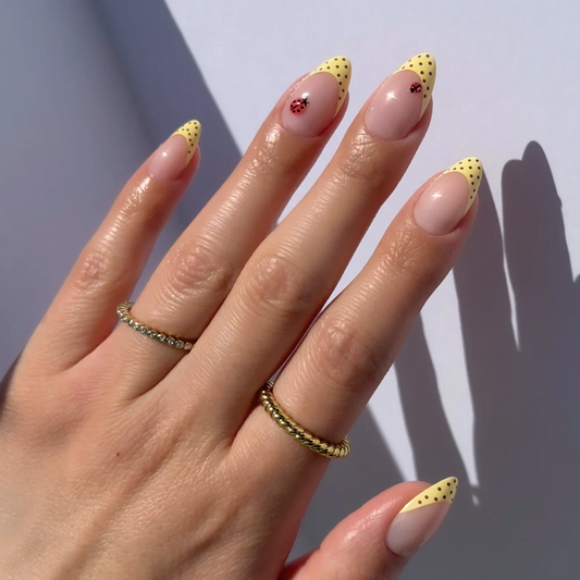 Lady Luck polka dot press-on nails - almond shape, front view