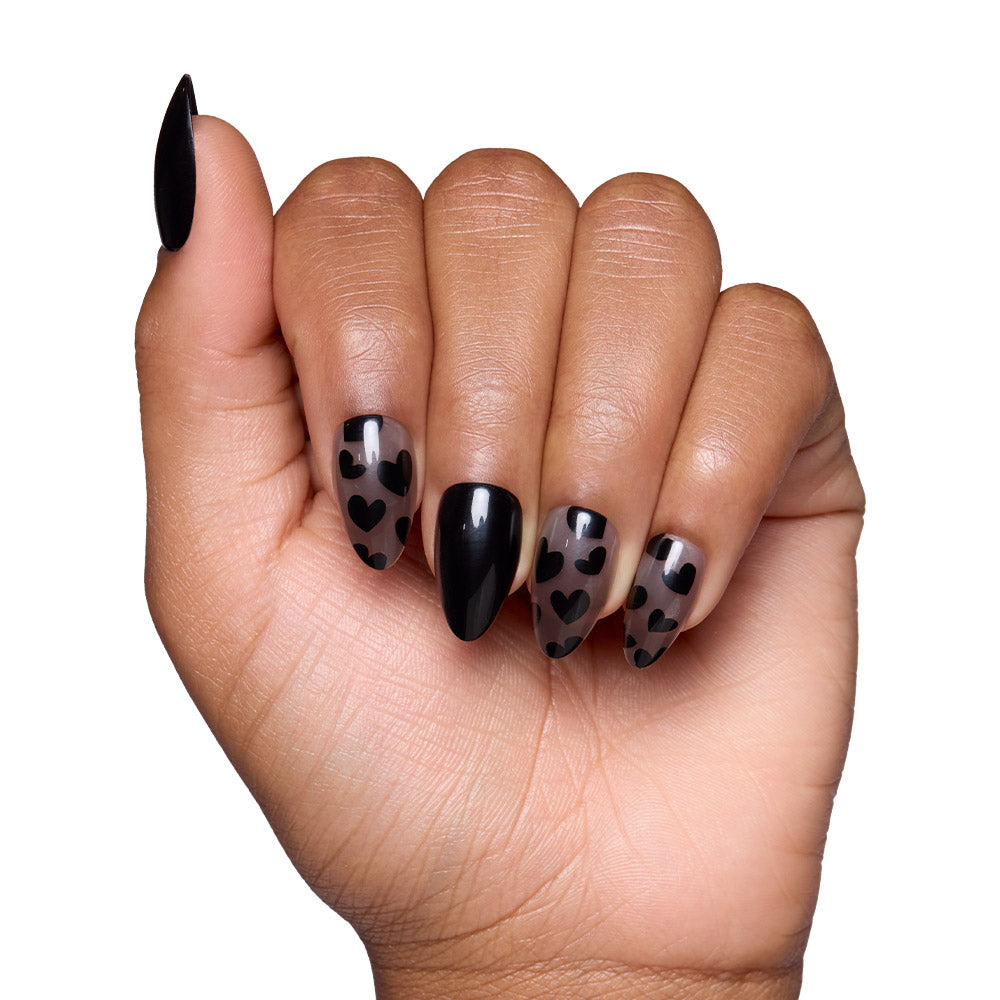 Love Me Not press-on nails on hand - lifestyle photo, floral finish