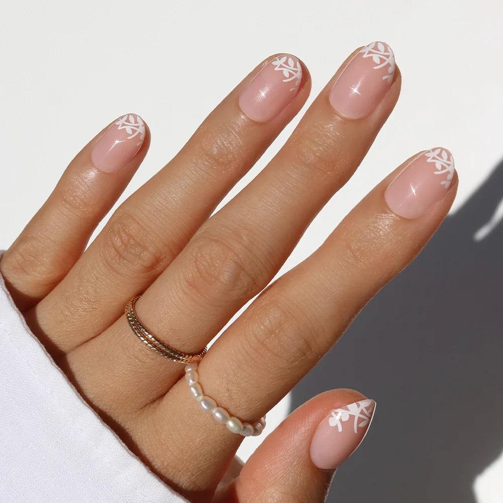 Love Preserved milky cloud dancer press-on nails - oval shape, front view