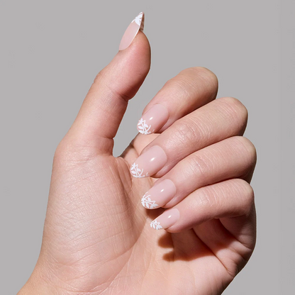 Love Preserved press-on nails on hand - lifestyle photo, milky cloud dancer finish