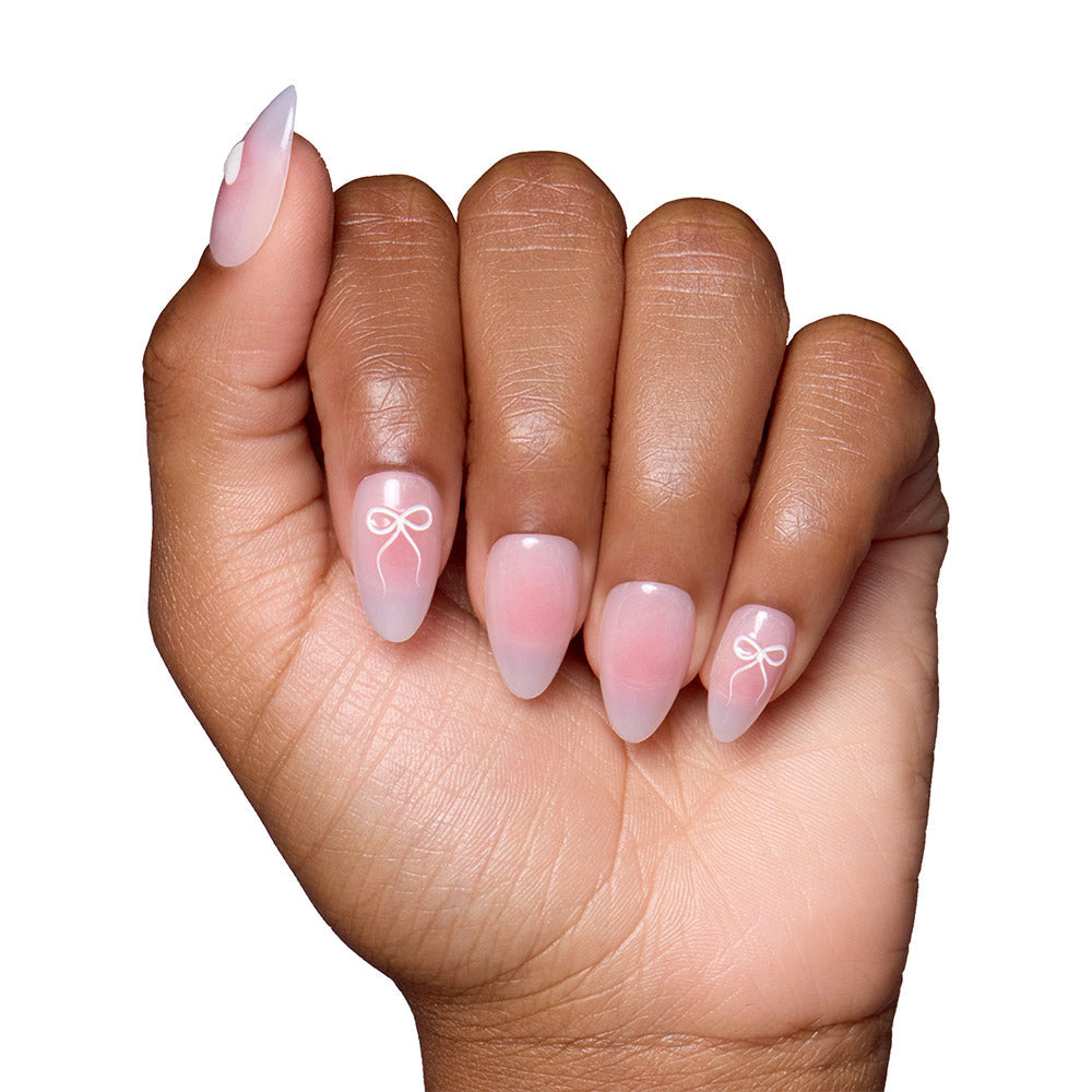 Lovers Knot press-on nails on hand - lifestyle photo, 3d sculptural finish