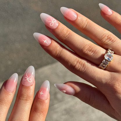 Lovers Knot 3d sculptural press-on nails - almond shape, front view