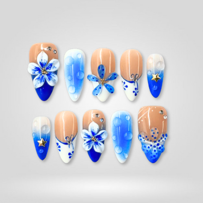 Blue Bloom floral press-on nails - almond shape, front view