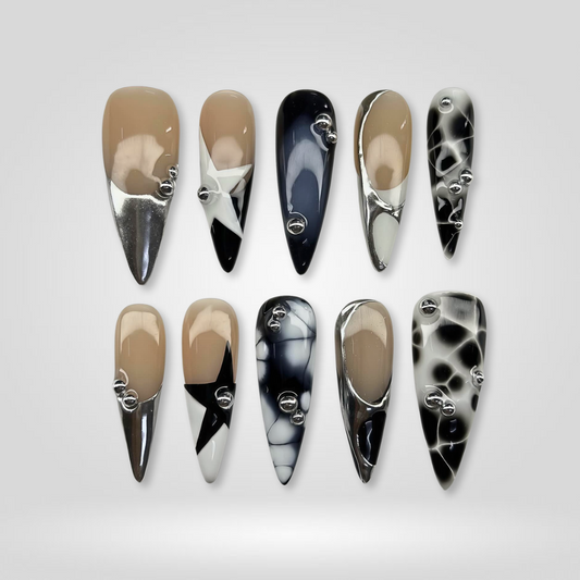Shadow Engrave 3d sculptural press-on nails - almond shape, front view