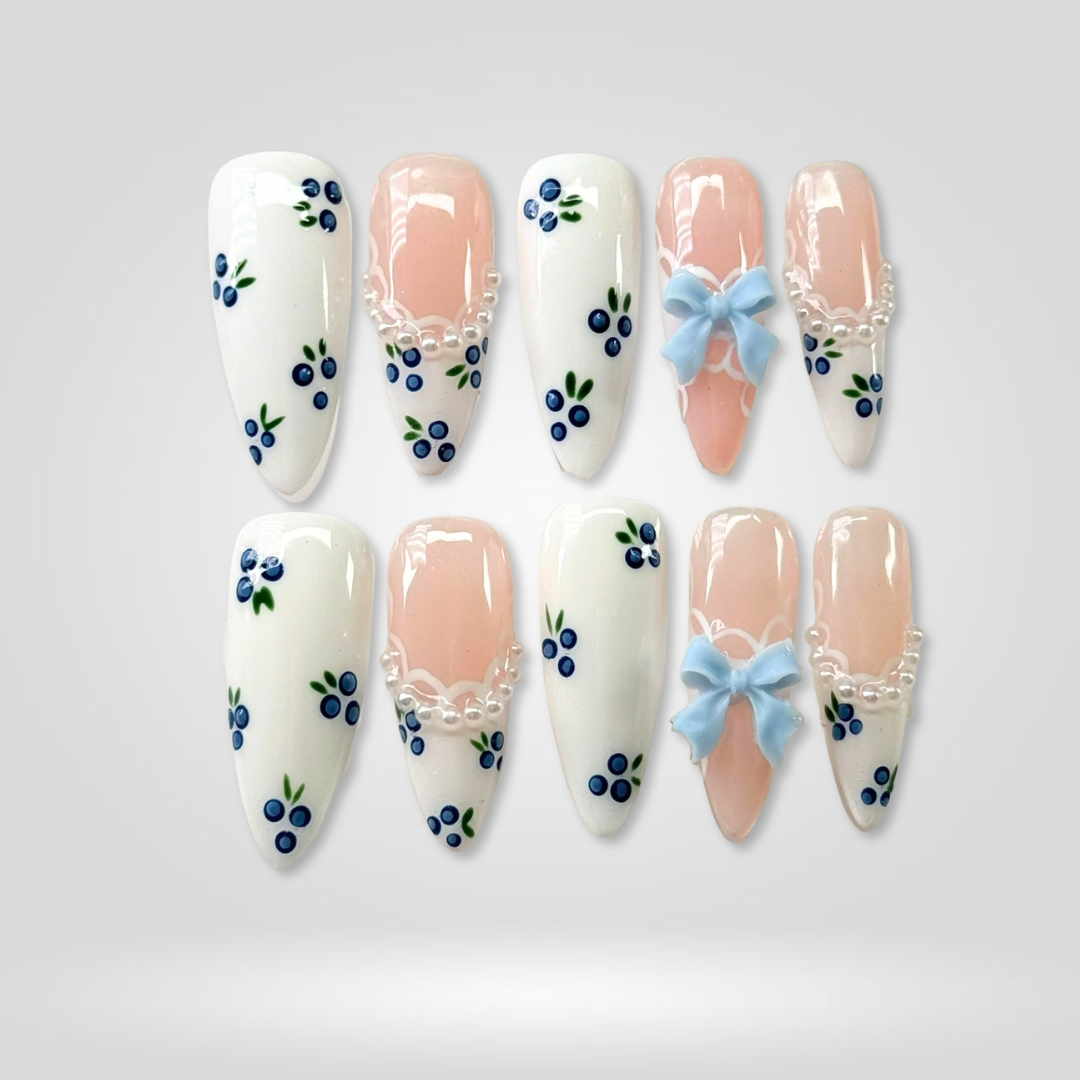 Blueberry Bow soft neutral press-on nails - almond shape, front view