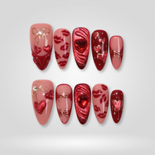 A Kiss to Remember cat-eye velvet press-on nails - almond shape, front view