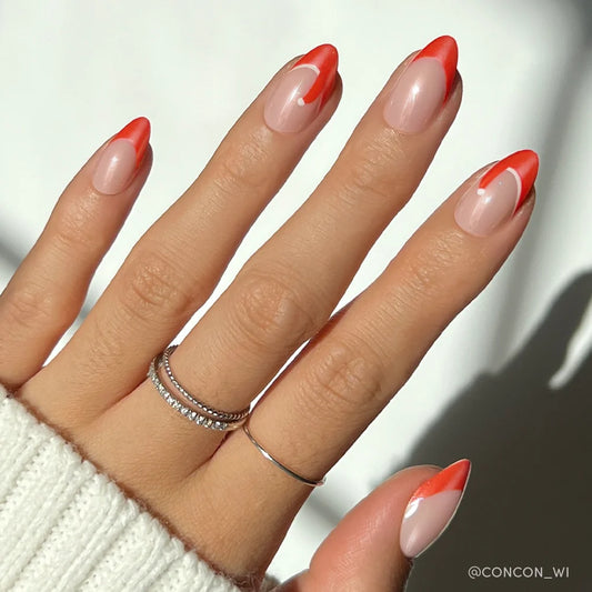 Mrs. Claus french tip press-on nails - almond shape, front view