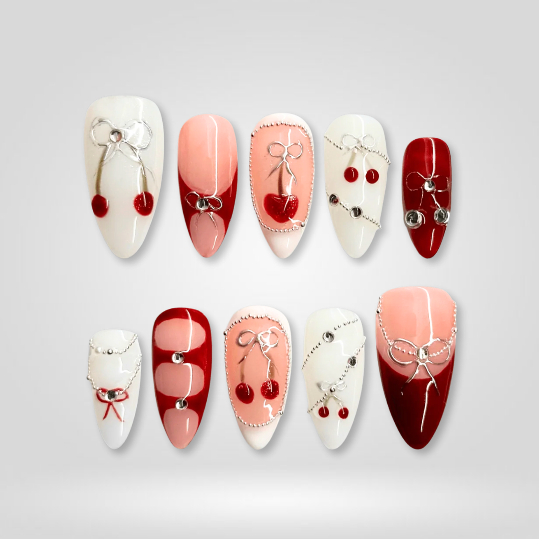 Silver Cherry pearl-shift press-on nails - almond shape, front view