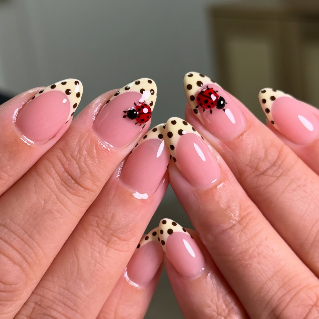 Lady Charm polka dot press-on nails - almond shape, front view