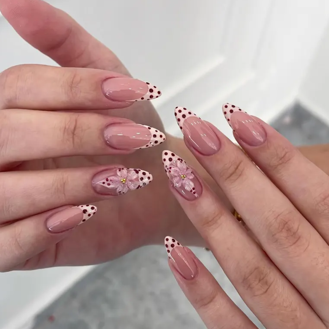 Cherry Blush polka dot press-on nails - almond shape, front view