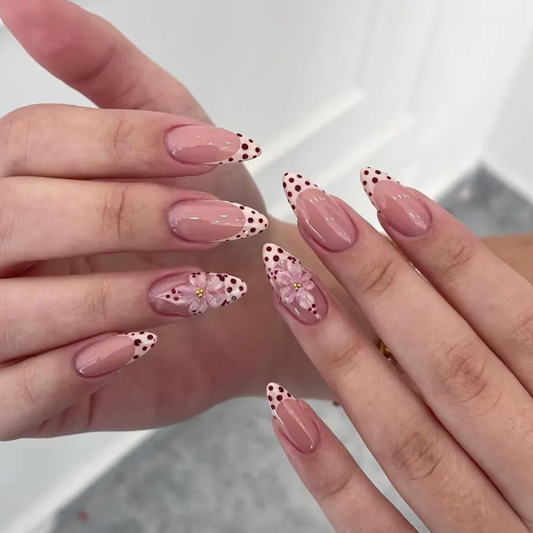 Cherry Blush polka dot press-on nails - almond shape, front view