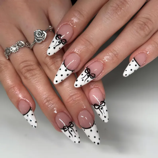 Bow Chic polka dot press-on nails - almond shape, front view