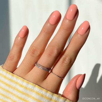 Peach Coral pastel press-on nails - round shape, front view