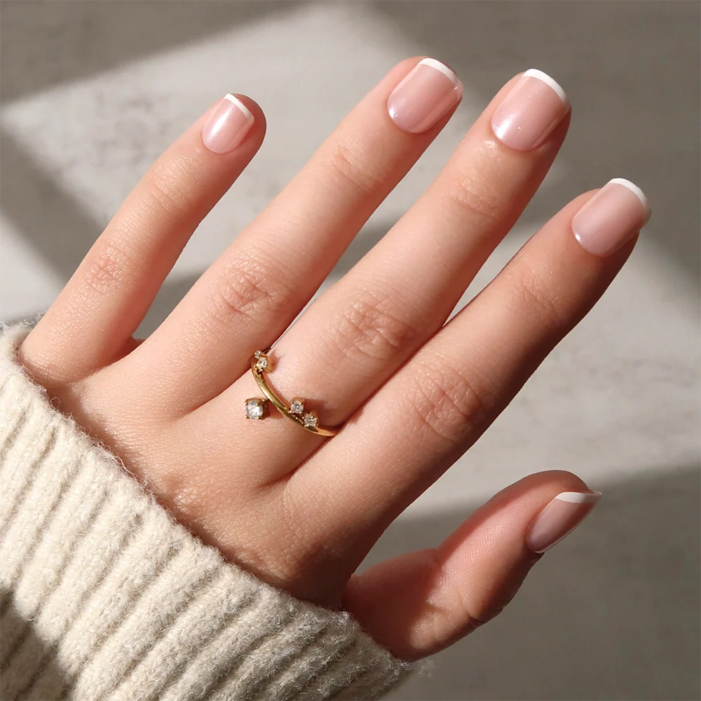 Pearly Please milky cloud dancer press-on nails - round shape, front view